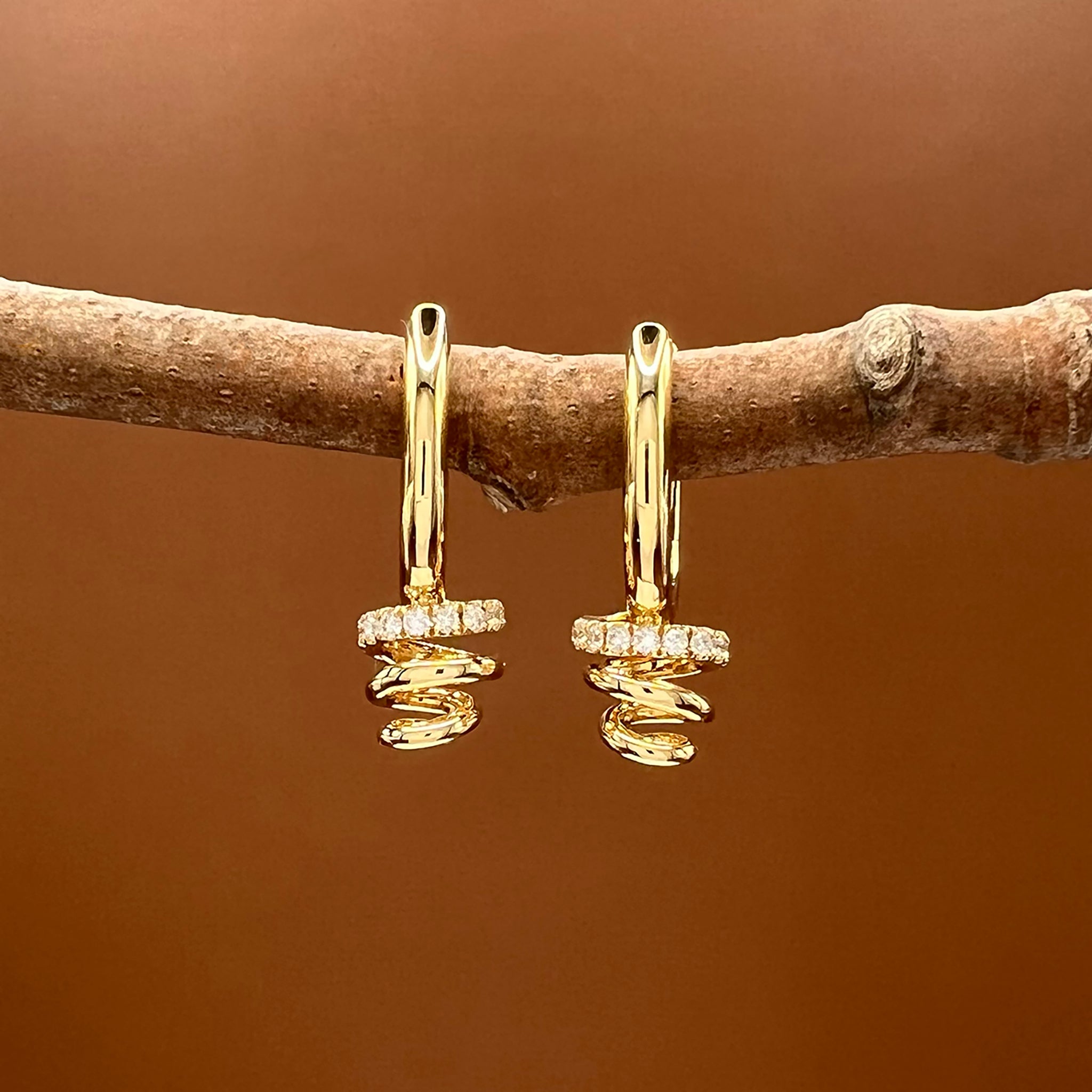 Diamond Accented Swirl Earrings