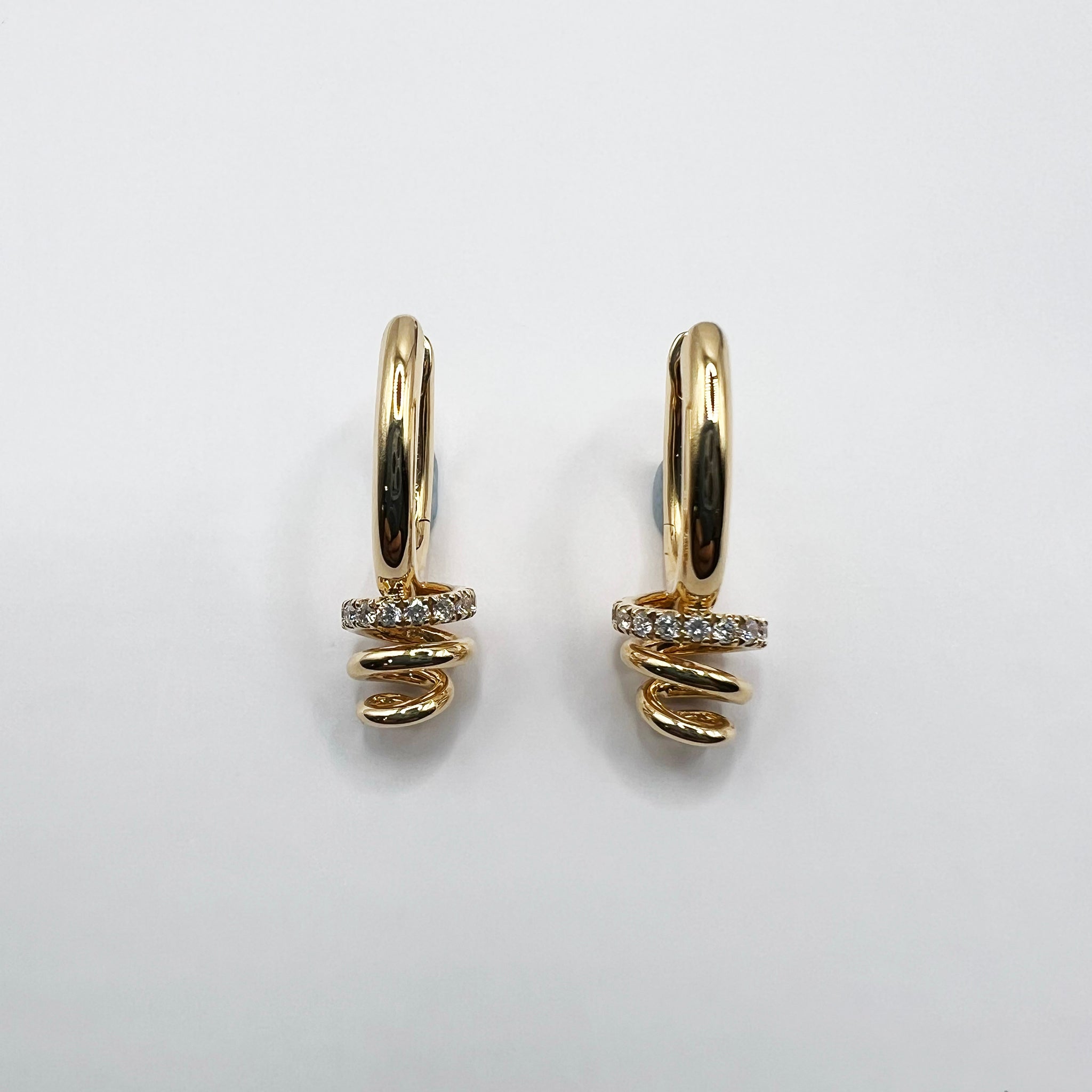 Diamond Accented Swirl Earrings