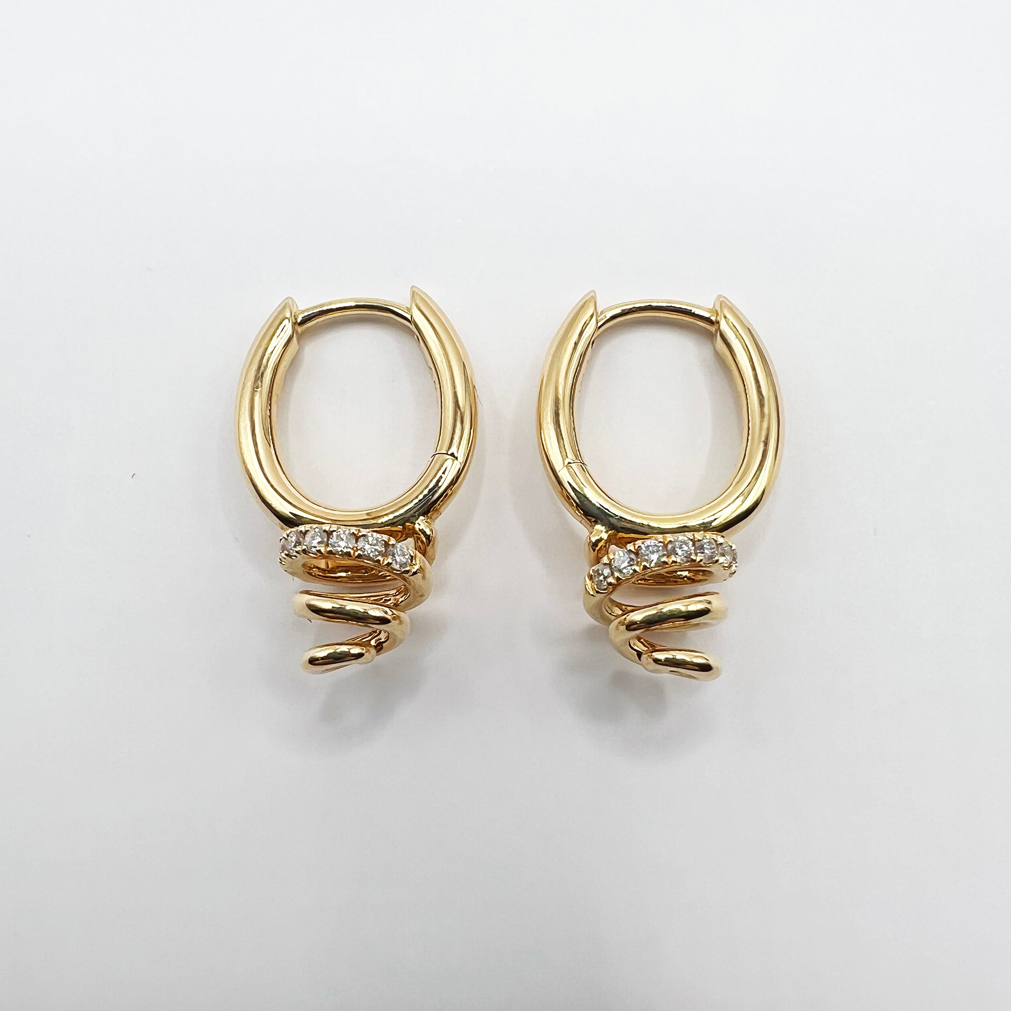 Diamond Accented Swirl Earrings