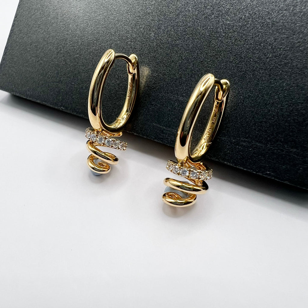 Diamond Accented Swirl Earrings